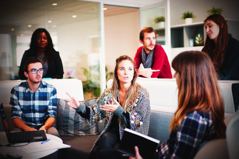 this an image of learners sitting around discussing qqi courses